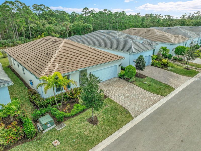 Front exterior of a new home in , Stuart, FL, highlighting curb appeal (Image 2).