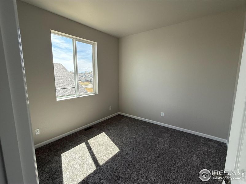 Spacious, unfurnished interior of a new home in Highlands Preserve, Mead (Image 11).