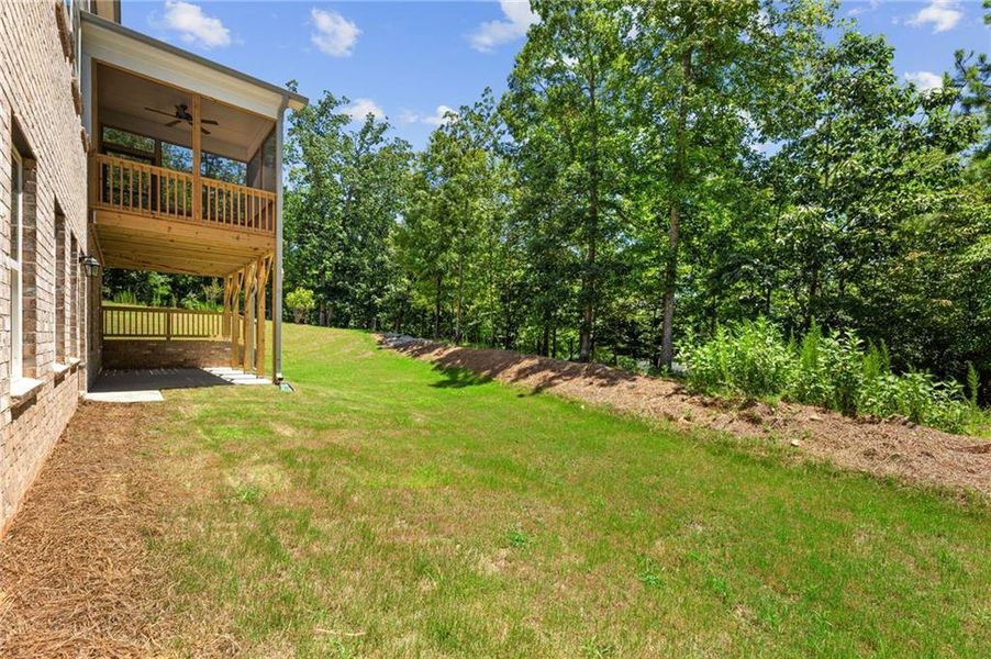 Exterior details and patio area of a home in Melody Lakeside Estates, Buford (Image 13).