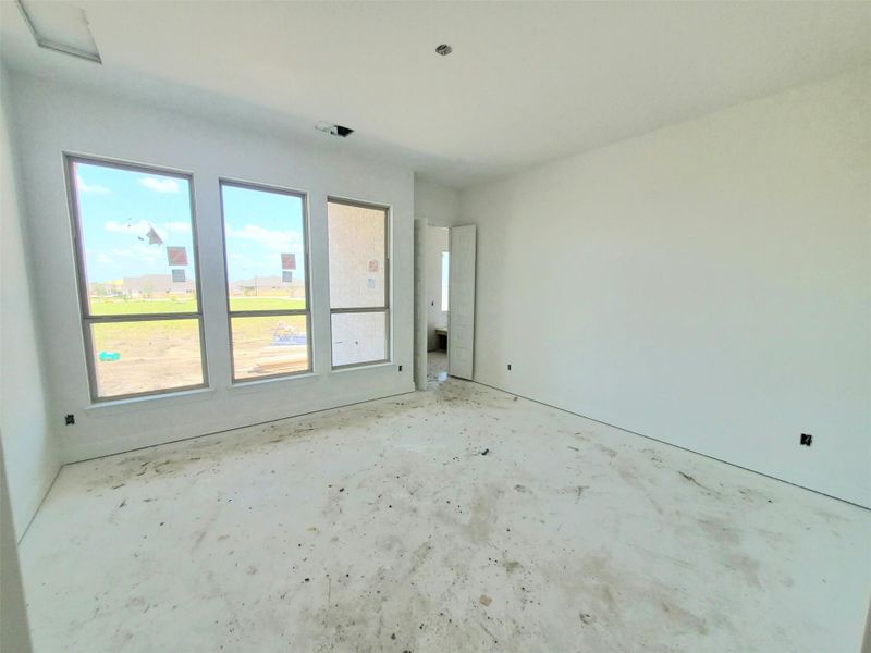 Unfurnished room with unfinished concrete floors Unfurnished room with unfinished concrete floors