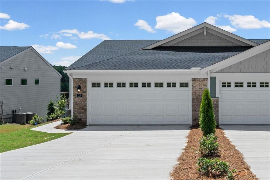 Front exterior of a new home in Villas at Gold Creek, Dawsonville, GA, highlighting curb appeal (Image 21).