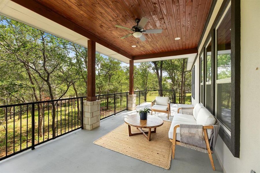 Sunroom / solarium with wooden ceiling and ceiling fan