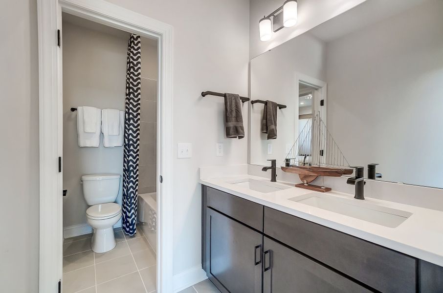 Representative furnished interior of a home built from the Lexington II by Caruso Homes in Rolling Meadows, Mooresville (Image 61).