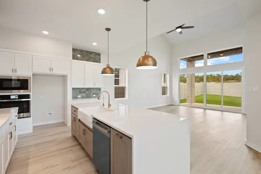 Furnished interior view inside a new home in Arbor Collection At Wolf Ranch, Georgetown (Image 9).