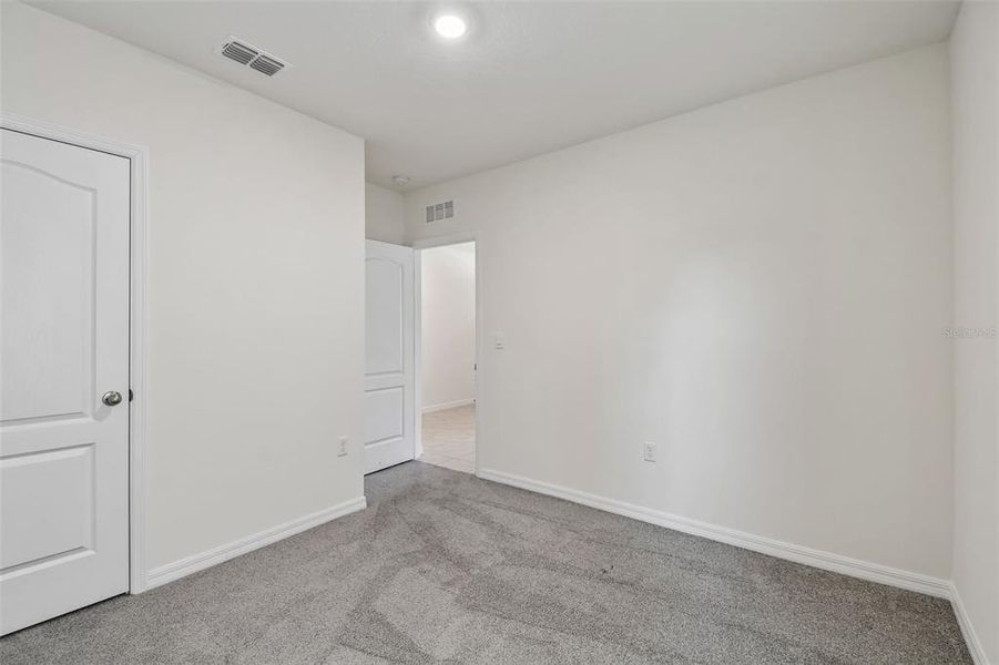 Spacious, unfurnished interior of a new home in Riviera Bella, Debary (Image 42).