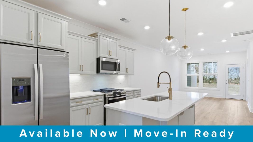 First-rate kitchen with functional layout, designer pendant lighting, and a large center island First-rate kitchen with functional layout, designer pendant lighting, and a large center island