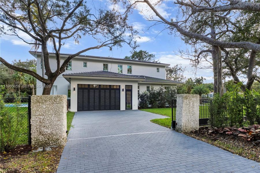 Front exterior of a new home in , Miami, FL, highlighting curb appeal (Image 22).