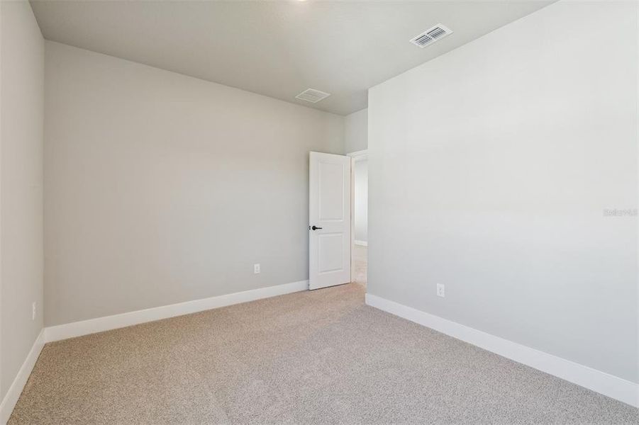 Spacious, unfurnished interior of a new home in North River Ranch – Townhomes, Parrish (Image 21).