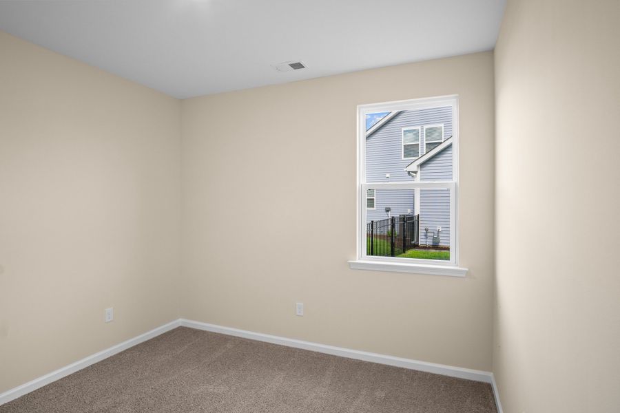Spacious, unfurnished interior of a new home in The Willows, Loris (Image 14).