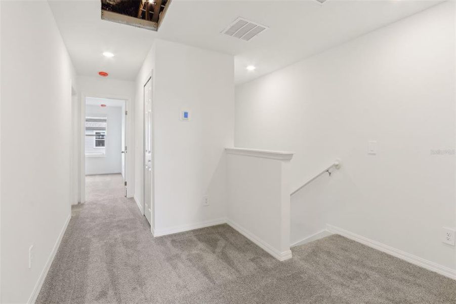 Spacious, unfurnished interior of a new home in The Meadow at Crossprairie Townes, St. Cloud (Image 19).