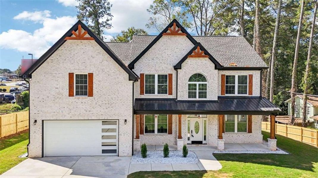 Front exterior of a new home in , Lilburn, GA, highlighting curb appeal (Image 27). Front exterior of a new home in , Lilburn, GA, highlighting curb appeal (Image 27).