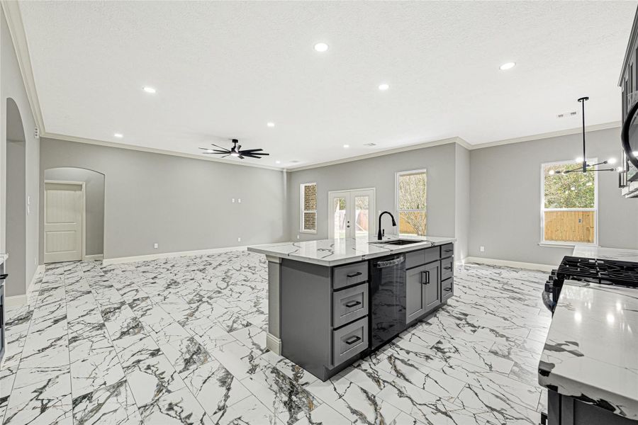 Gorgeous gourmet kitchen with oversized island and walk-in pantry. Gorgeous gourmet kitchen with oversized island and walk-in pantry.
