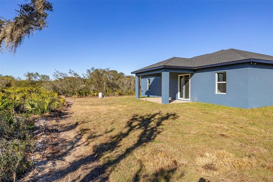 Exterior details and patio area of a home in , Avon Park (Image 30). Exterior details and patio area of a home in , Avon Park (Image 30).