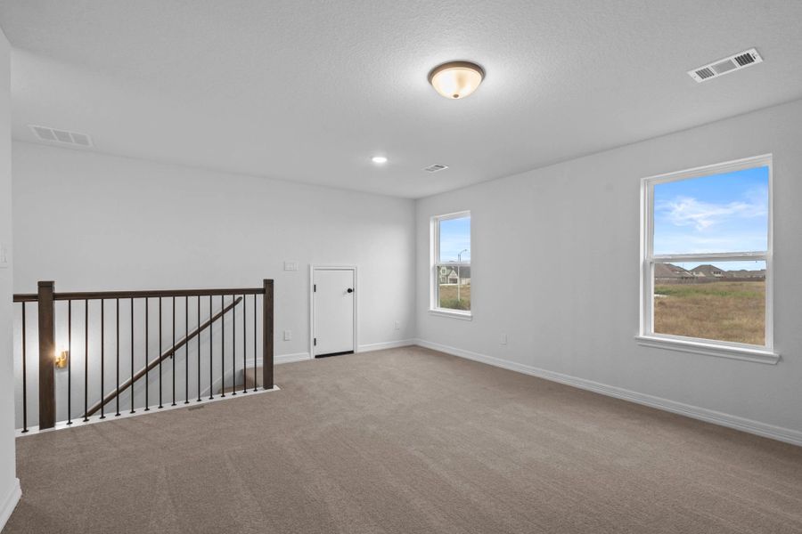 Upstairs loft. Sample product photo. Actual exterior and interior selections may vary by homesite. Photo may be virtually staged. Upstairs loft. Sample product photo. Actual exterior and interior selections may vary by homesite. Photo may be virtually staged.