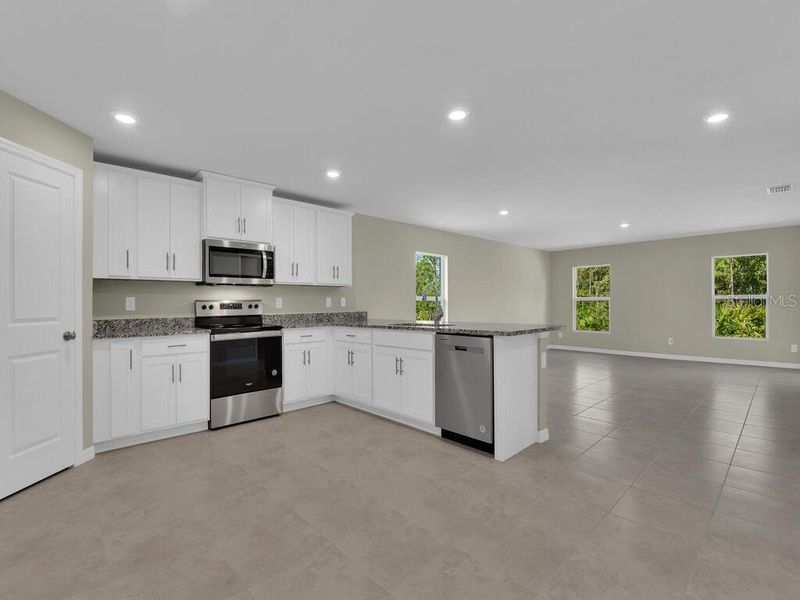 Furnished interior view inside a new home in , Port Charlotte (Image 3).