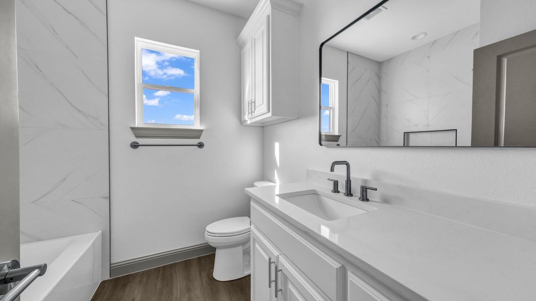 Representative furnished interior of a home built from the Jarrett 2 by Zeal Home Builders in Sunrise Point, Weatherford (Image 11).