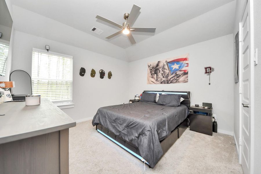 Furnished interior view inside a new home in , Conroe (Image 15).