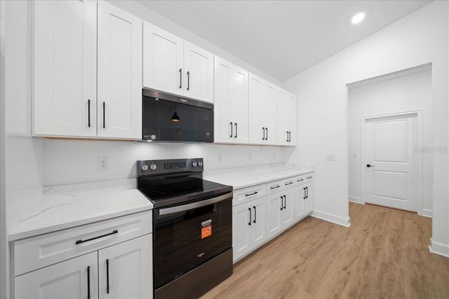 Furnished interior view inside a new home in , Spring Hill (Image 9).
