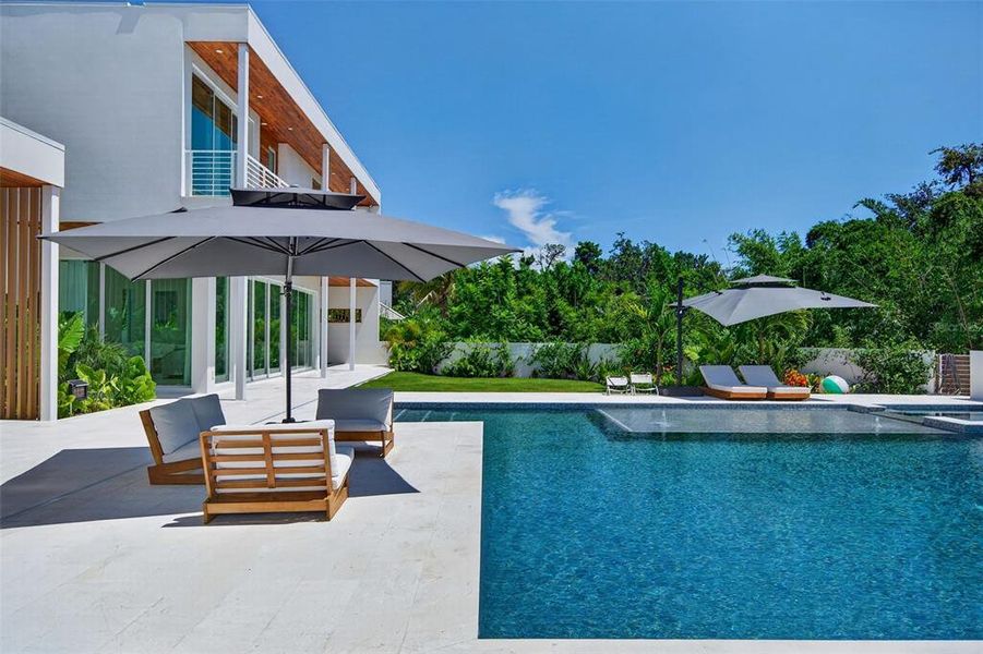 Exterior details and patio area of a home in , Sarasota (Image 46).