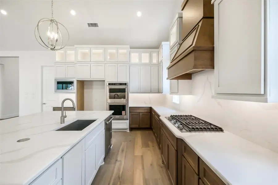 Furnished interior view inside a new home in Evergreen 70', Conroe (Image 3).