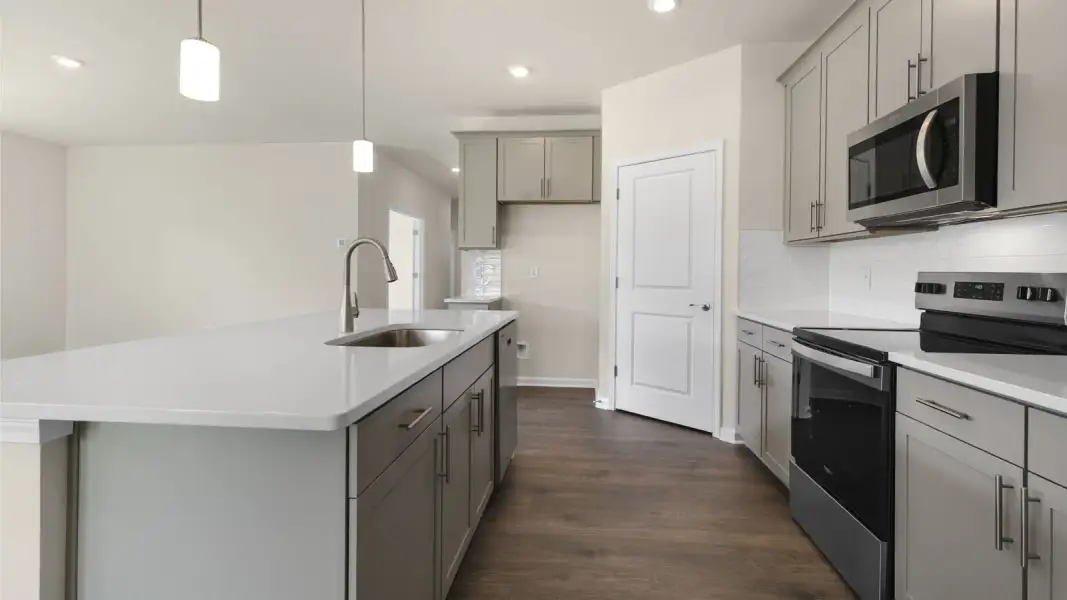 Furnished interior view inside a new home in The Villas at Galvins Ridge, Sanford (Image 8).
