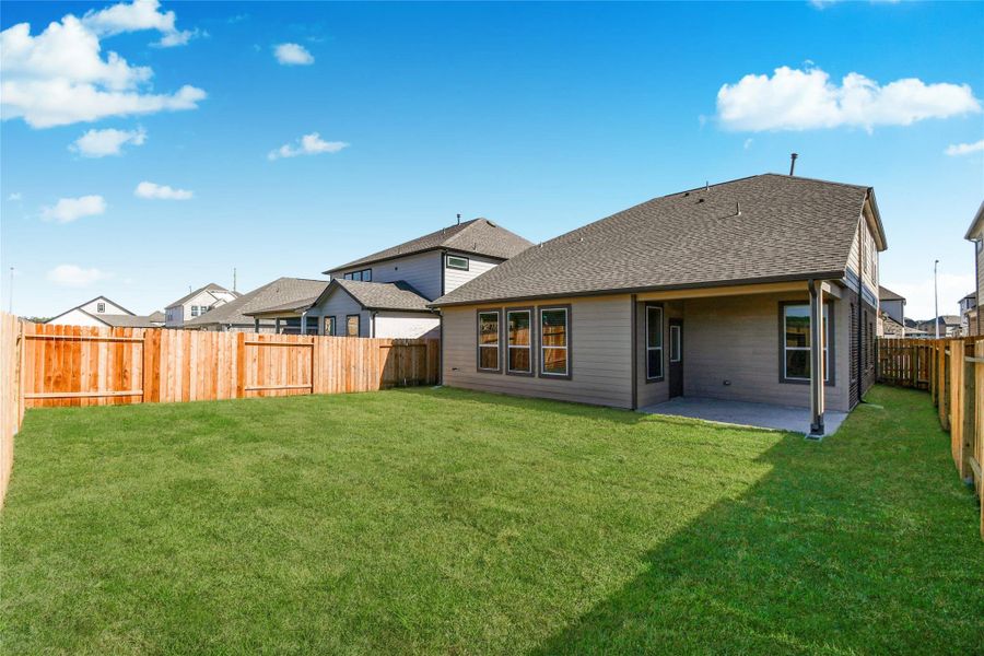 Come and see this spacious backyard with its beautiful covered patio. There is plenty ofroom for the kids to play and adults to relax. Perfect for your outdoor living space, patiofurniture, bbq pit, and so much more. The possibilities are endless! Sample photo of completed home with similar floor plan. Actual colors and selections may vary. Come and see this spacious backyard with its beautiful covered patio. There is plenty ofroom for the kids to play and adults to relax. Perfect for your outdoor living space, patiofurniture, bbq pit, and so much more. The possibilities are endless! Sample photo of completed home with similar floor plan. Actual colors and selections may vary.