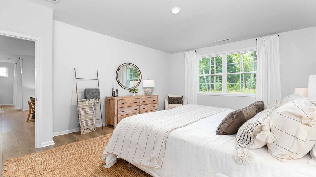 Furnished interior view inside a new home in The Villas at Kinsley, Jamestown (Image 25).