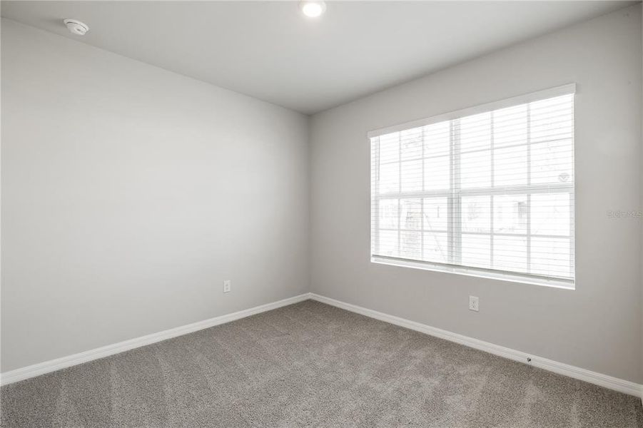 Spacious, unfurnished interior of a new home in Coral Lakes - Tradition & Express, Punta Gorda (Image 14). Spacious, unfurnished interior of a new home in Coral Lakes - Tradition & Express, Punta Gorda (Image 14).