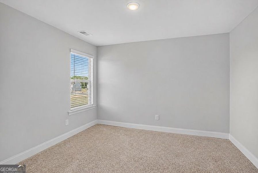Spacious, unfurnished interior of a new home in Stone Brooke, Gray (Image 31).