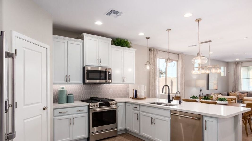 Representative furnished interior of a home built from the Champlain by Taylor Morrison in Mystic Discovery Collection, Peoria (Image 58). Representative furnished interior of a home built from the Champlain by Taylor Morrison in Mystic Discovery Collection, Peoria (Image 58).