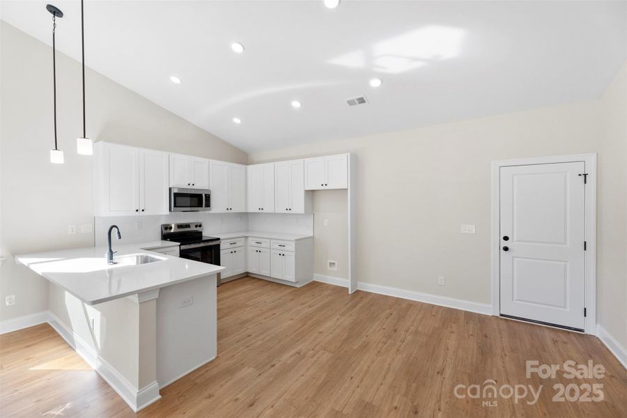 Furnished interior view inside a new home in , Monroe (Image 13).