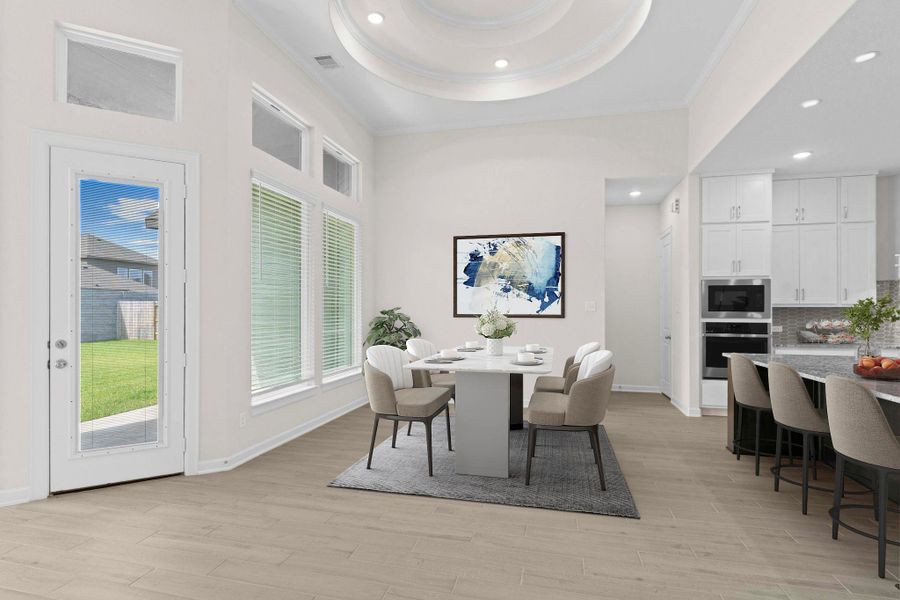 Elegant living area with recessed ceiling detail and easy access to the kitchen, blending style and comfort in the heart of the home. *Virtually Staged*