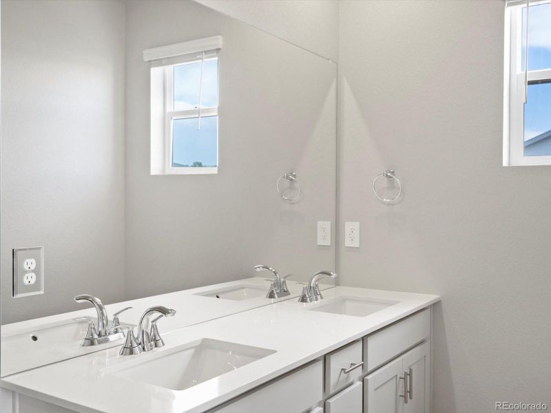 Furnished interior view inside a new home in Poudre Heights: The Alpine Collection, Windsor (Image 9).