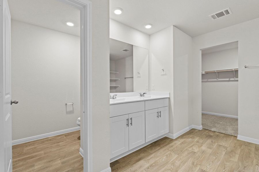 Furnished interior view inside a new home in Whisper South, San Marcos (Image 9).