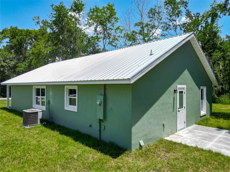 Front exterior of a new home in , Lake Panasoffkee, FL, highlighting curb appeal (Image 23).