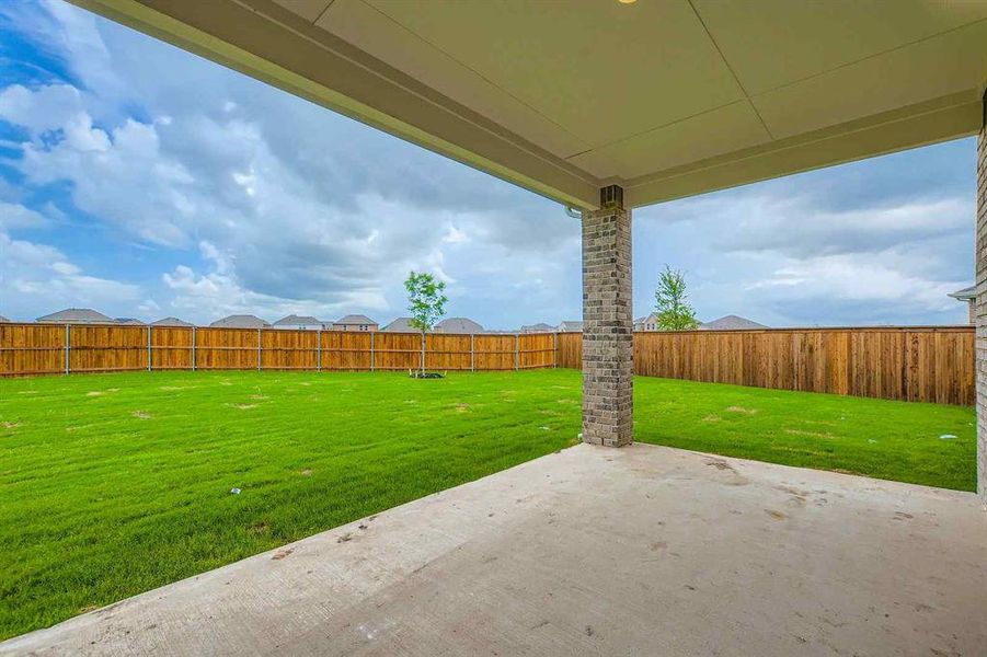Exterior details and patio area of a home in The Estates Collection at Overland Grove, Forney (Image 16).