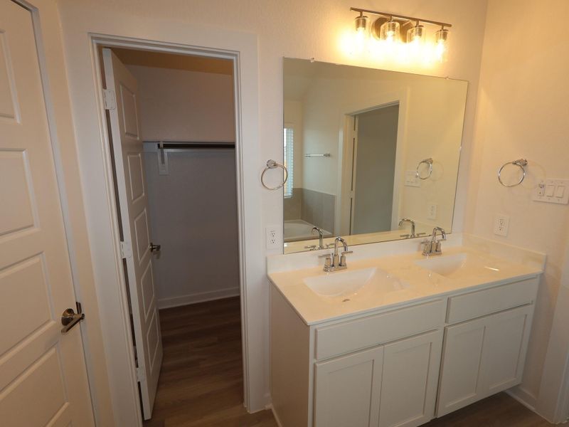 Furnished interior view inside a new home in Lone Star Landing, Montgomery (Image 8).