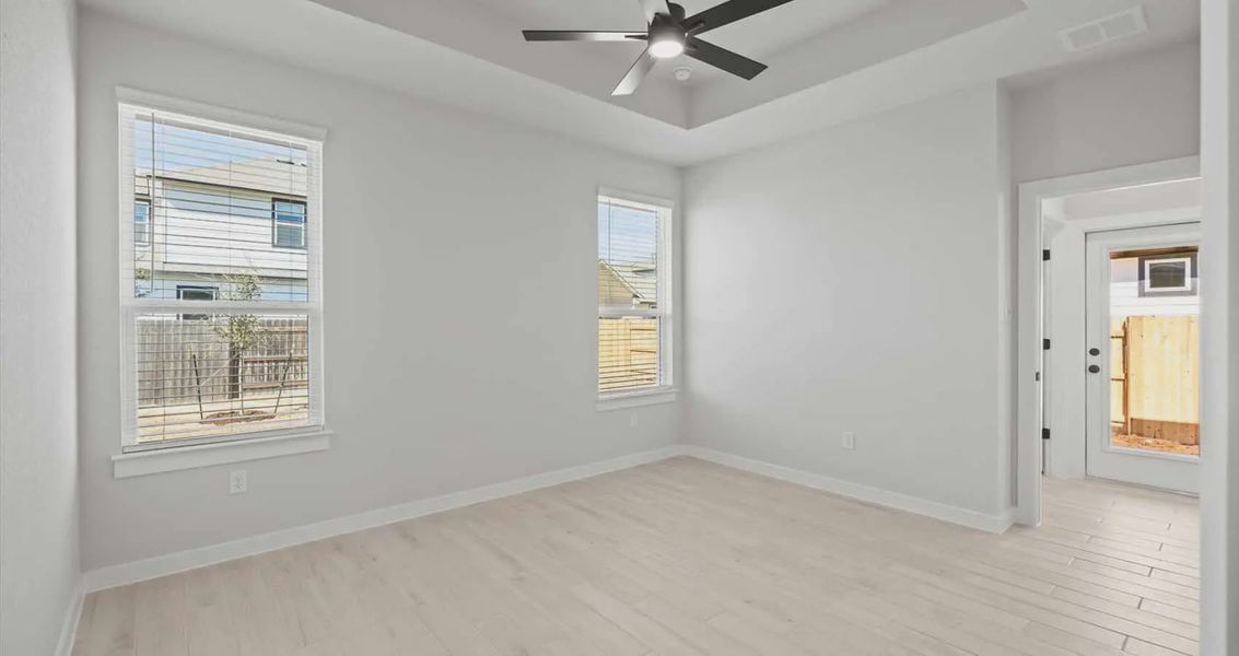 Representative unfurnished interior of a home built from the Avril by Chesmar Homes in Trace, New Caney (Image 18).