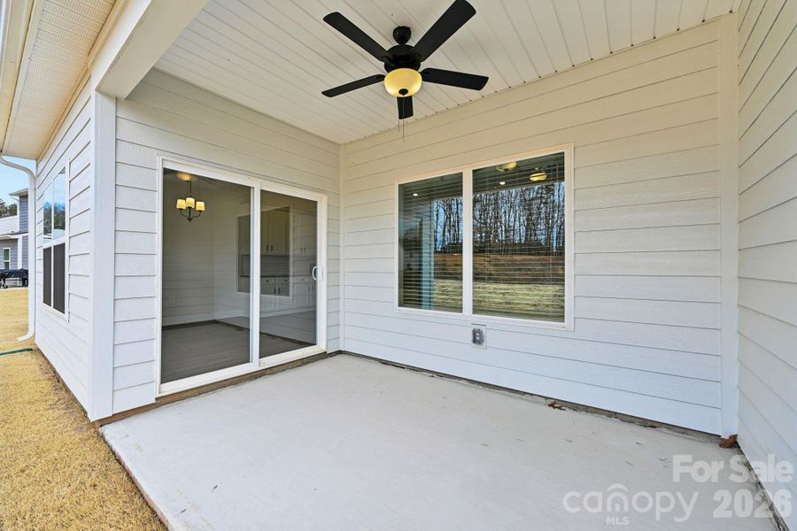 Exterior details and patio area of a home in Colonial Crossing, Troutman (Image 12).
