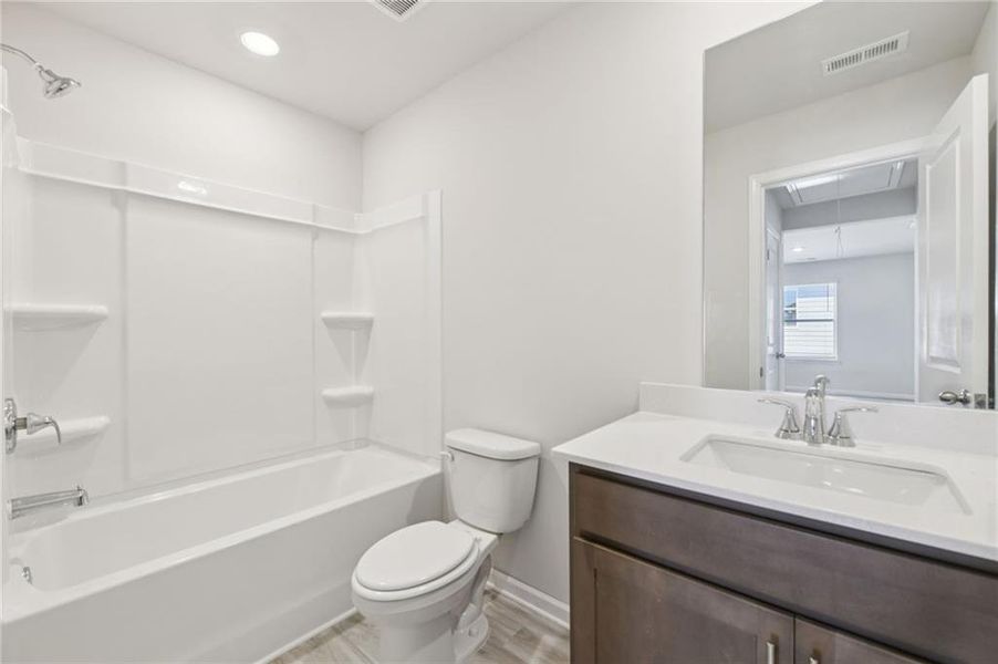 Furnished interior view inside a new home in Avalon - Reserve Series, Conyers (Image 9).
