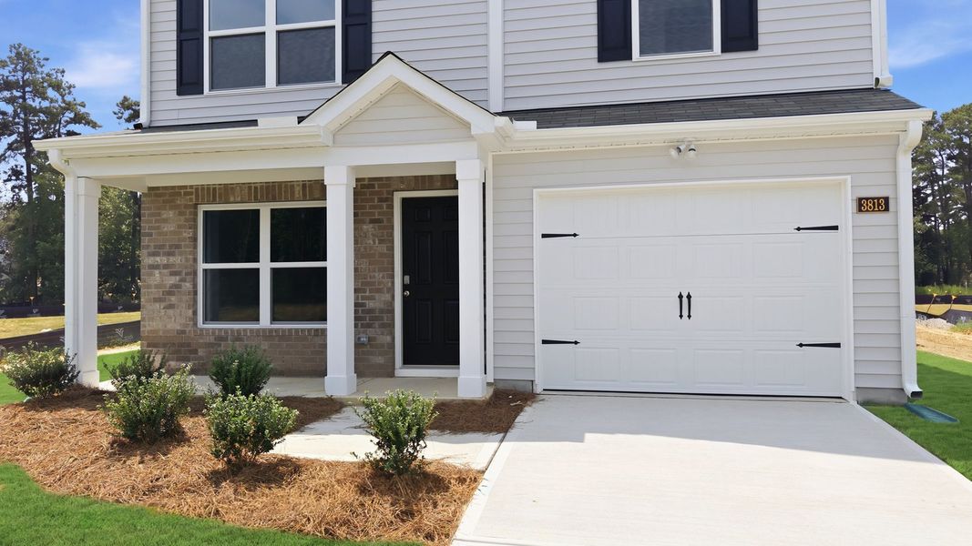 Front exterior of a new home in Jetstream Park, Wilson, NC, highlighting curb appeal (Image 18). Front exterior of a new home in Jetstream Park, Wilson, NC, highlighting curb appeal (Image 18).