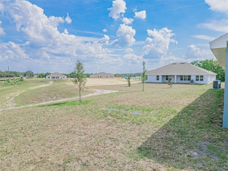 Exterior details and patio area of a home in Hickory Ridge Estates, Lake Wales (Image 20).