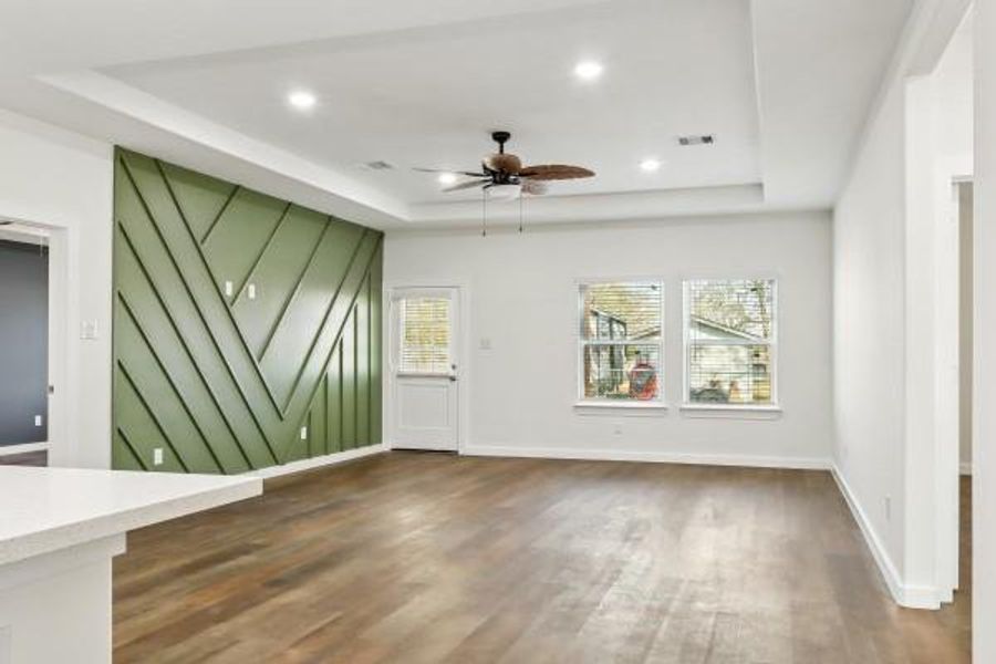 Experience a touch of elegance with a striking accent wall in the living area, offering a stylish focal point for your home. Experience a touch of elegance with a striking accent wall in the living area, offering a stylish focal point for your home.