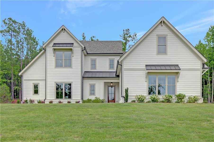 Front exterior of a new home in , Newnan, GA, highlighting curb appeal (Image 30). Front exterior of a new home in , Newnan, GA, highlighting curb appeal (Image 30).