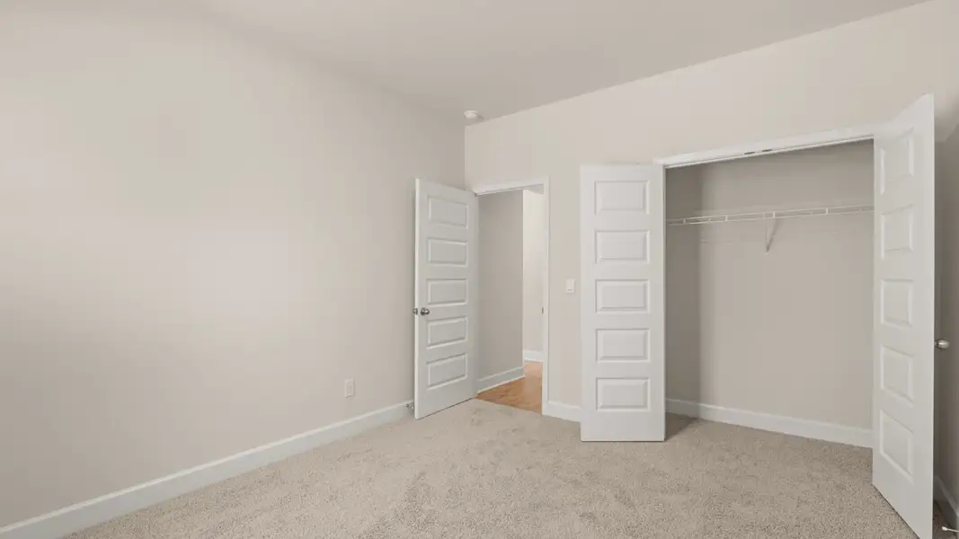 Representative unfurnished interior of a home built from the Hampshire by D.R. Horton in Heritage Pointe, Senoia (Image 27).
