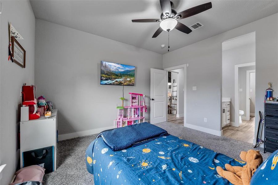 Bedroom featuring ceiling fan