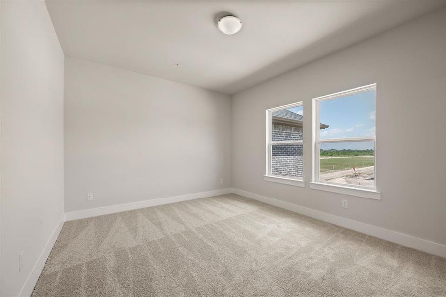 Our Bella plan offers a spacious secondary bedroom complete with en suite bath!