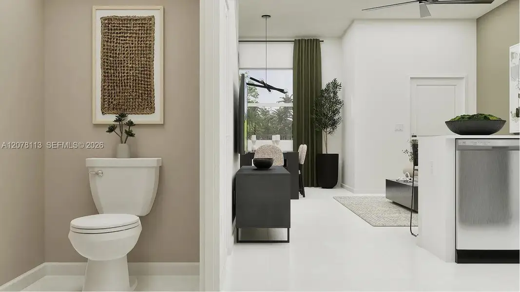 Readily available off the kitchen, this powder room provides easy convenience to residents and guests.