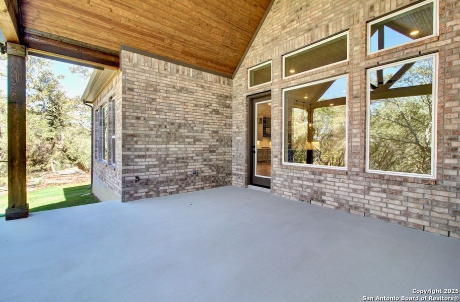 Exterior details and patio area of a home in Verandas at the Rim, San Antonio (Image 3). Exterior details and patio area of a home in Verandas at the Rim, San Antonio (Image 3).
