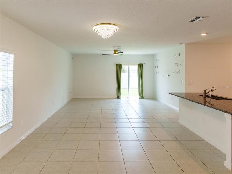 Spacious, unfurnished interior of a new home in The Isle of Avalon, Spring Hill (Image 13).